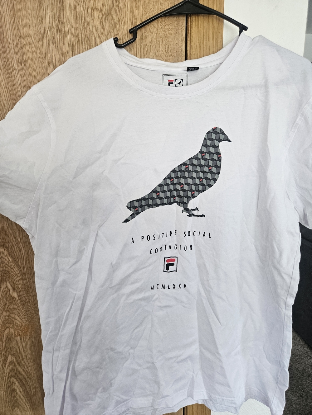 White Graphic Tee with Geometric Bird and Logo